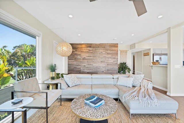1631 Neptune Ave, Encinitas, CA 92024 - living room with recessed lighting, wooden walls, and baseboards