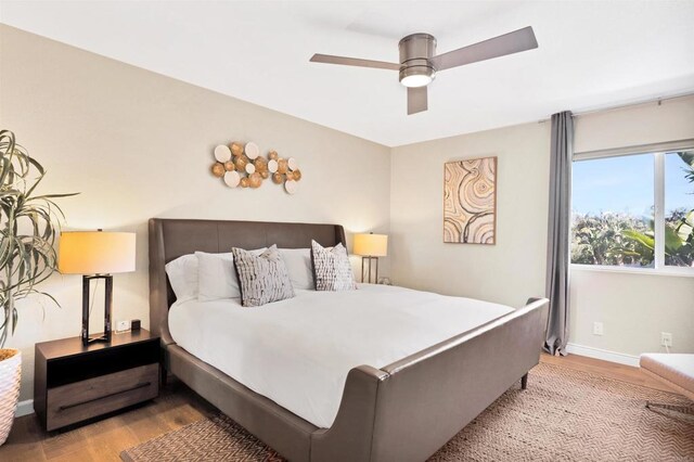 1631 Neptune Ave, Encinitas, CA 92024 - bedroom with wood finished floors, baseboards, and a ceiling fan
