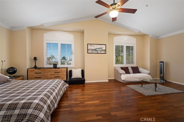bedroom with wood finished floors, baseboards, a ceiling fan, and lofted ceiling