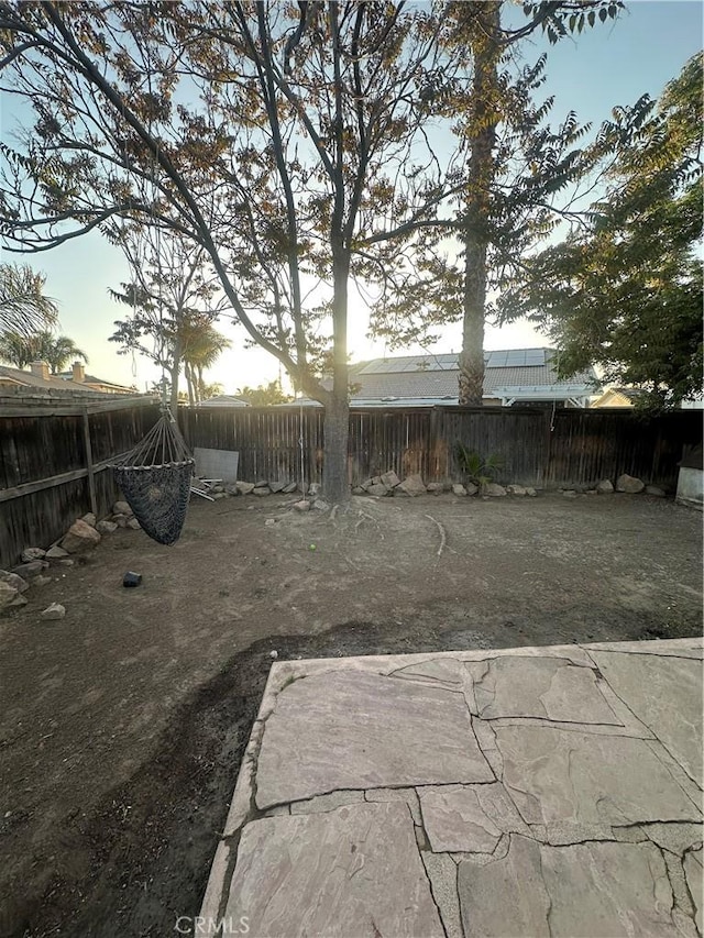 view of yard with a fenced backyard and a patio area