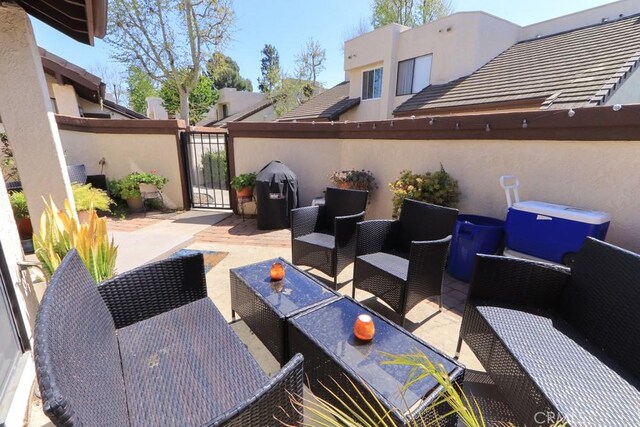 414 N Imperial Ave Unit D, Ontario, CA 91764 - view of patio with a gate and an outdoor living space