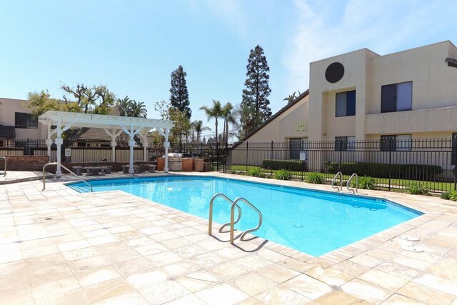 414 N Imperial Ave Unit D, Ontario, CA 91764 - community pool featuring a patio area and a pergola