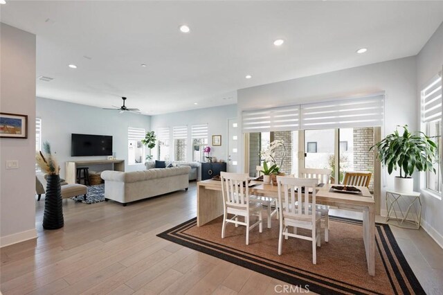 135 Bosal, Irvine, CA 92618 - dining space with healthy amount of natural light, a ceiling fan, light wood-style flooring, baseboards, and recessed lighting