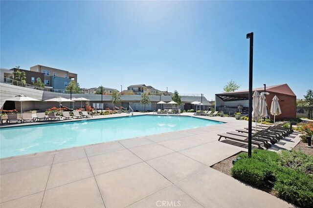 135 Bosal, Irvine, CA 92618 - community pool with a patio area