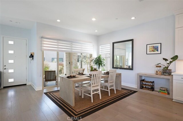 135 Bosal, Irvine, CA 92618 - dining space with light wood-style floors, baseboards, and recessed lighting