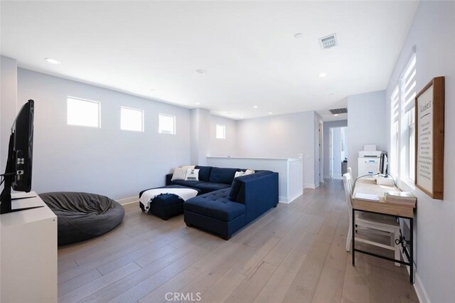 135 Bosal, Irvine, CA 92618 - living room with baseboards, light wood-type flooring, and recessed lighting