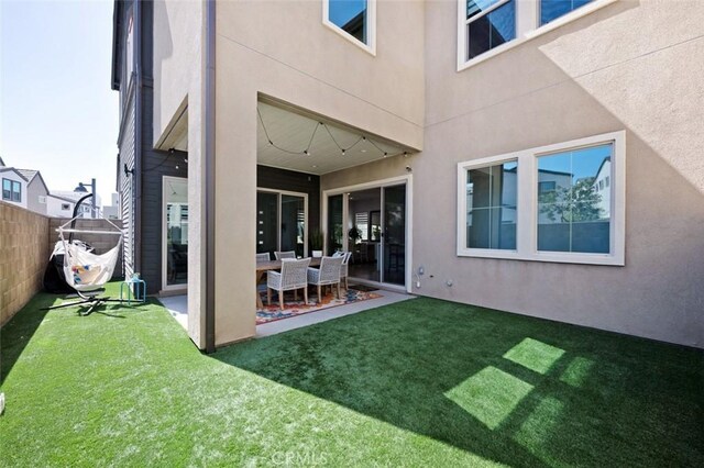 135 Bosal, Irvine, CA 92618 - back of house featuring stucco siding and a patio area