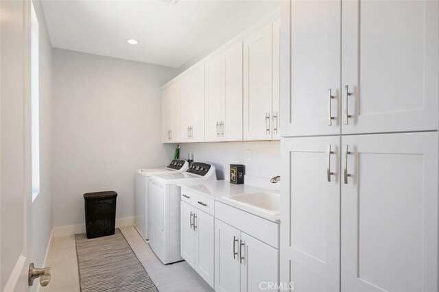 135 Bosal, Irvine, CA 92618 - washroom with cabinet space, washing machine and clothes dryer, baseboards, recessed lighting, and light tile patterned floors