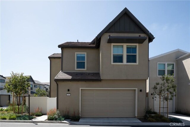 135 Bosal, Irvine, CA 92618 - view of front of home featuring stucco siding and a garage