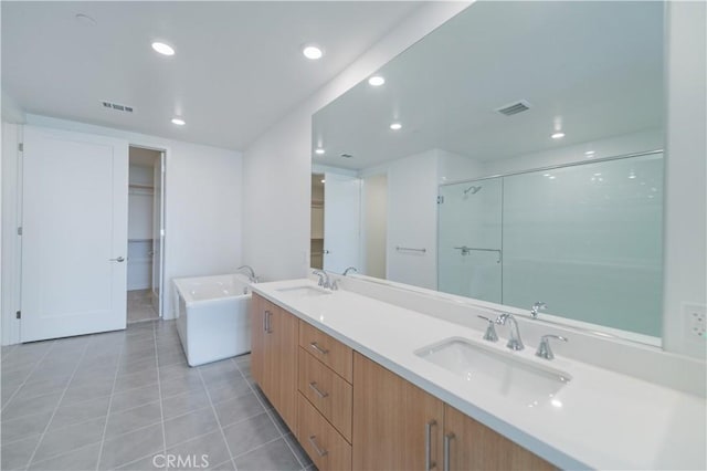 1406 Rivington, Irvine, CA 92612 - bathroom with a sink, visible vents, and tile patterned floors