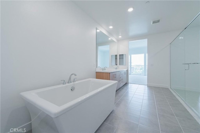 1406 Rivington, Irvine, CA 92612 - bathroom with tile patterned flooring, visible vents, a freestanding bath, recessed lighting, and vanity