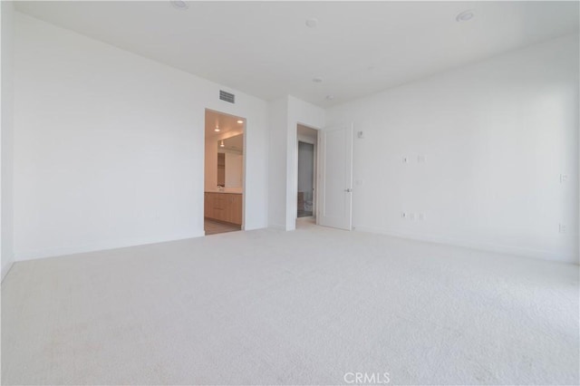 1406 Rivington, Irvine, CA 92612 - spare room with visible vents, baseboards, and light colored carpet