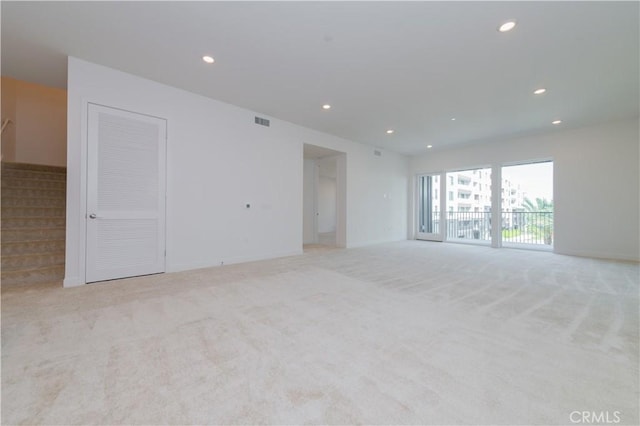 1406 Rivington, Irvine, CA 92612 - unfurnished room with stairway, recessed lighting, light colored carpet, and visible vents