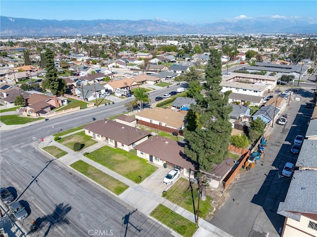 bird's eye view with a residential view and a mountain view