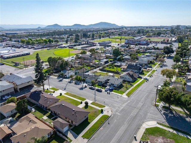 birds eye view of property with a residential view and a mountain view