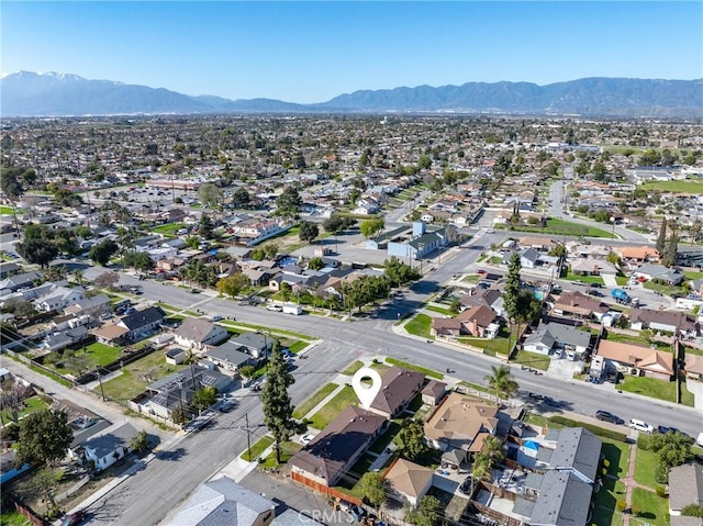 aerial view featuring a mountain view and a residential view