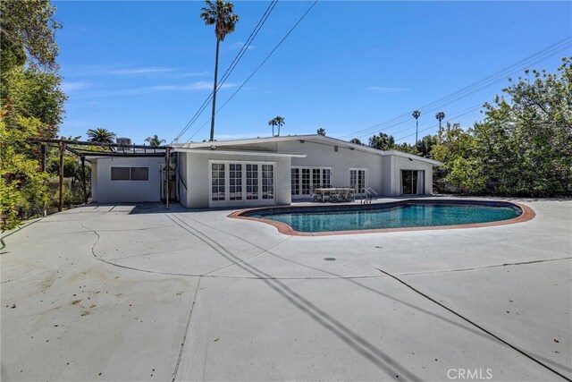 5115 Boda Pl, Woodland Hills, CA 91367 - swimming pool featuring a patio and french doors