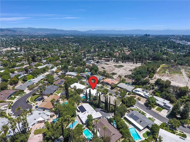 5115 Boda Pl, Woodland Hills, CA 91367 - aerial view of property's location featuring a pool area and a mountain backdrop