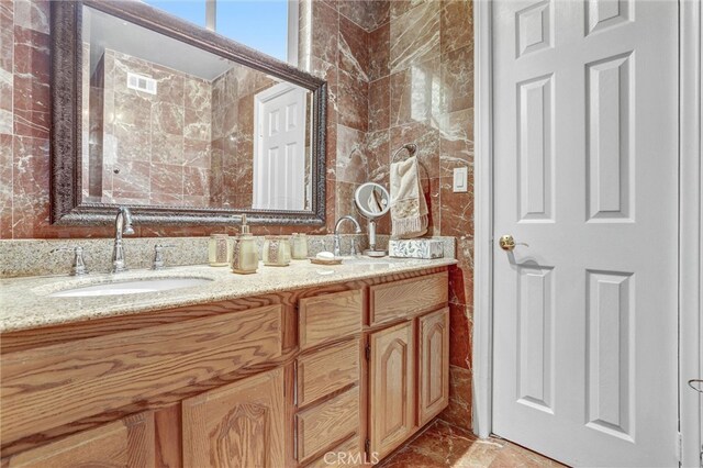 5115 Boda Pl, Woodland Hills, CA 91367 - full bathroom with double vanity and marble finish floors