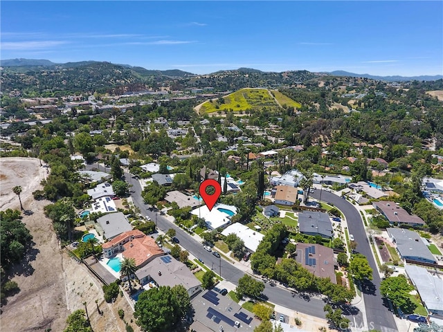 5115 Boda Pl, Woodland Hills, CA 91367 - aerial view of property and surrounding area with mountains, nearby suburban area, and a pool