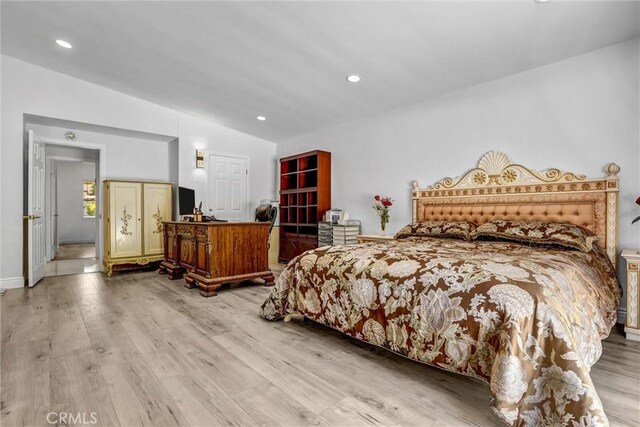 5115 Boda Pl, Woodland Hills, CA 91367 - bedroom with vaulted ceiling, light wood-style flooring, and recessed lighting