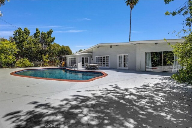 5115 Boda Pl, Woodland Hills, CA 91367 - view of swimming pool featuring french doors and a patio area