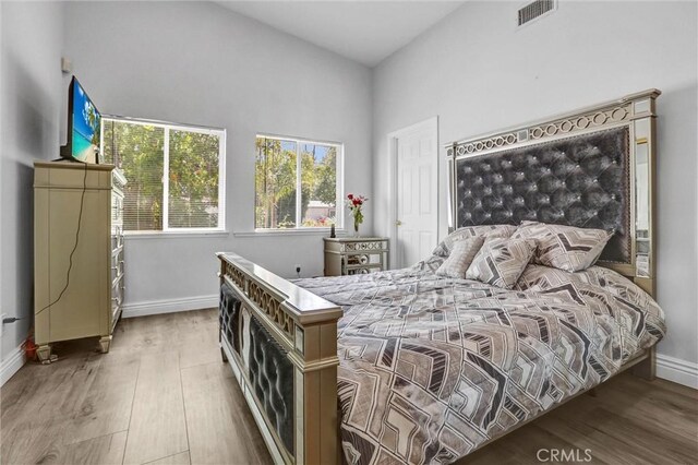 5115 Boda Pl, Woodland Hills, CA 91367 - bedroom featuring light wood-style floors and baseboards