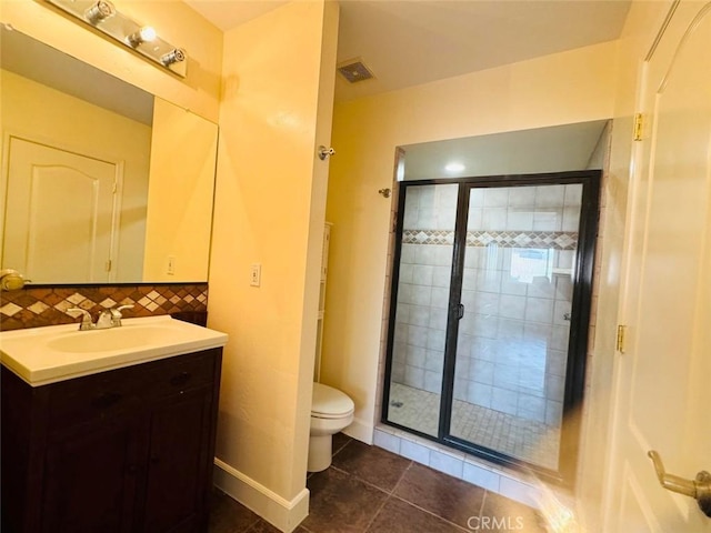 full bath with tile patterned floors, visible vents, toilet, a shower stall, and vanity