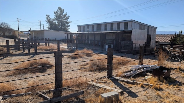 exterior space featuring an outbuilding and an exterior structure