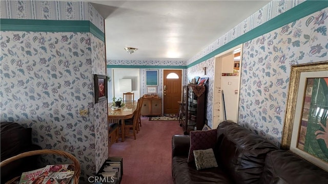 living area with carpet flooring and wallpapered walls