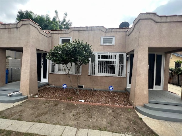 3030 W 12th Pl, Los Angeles, CA 90006 - exterior space featuring stucco siding