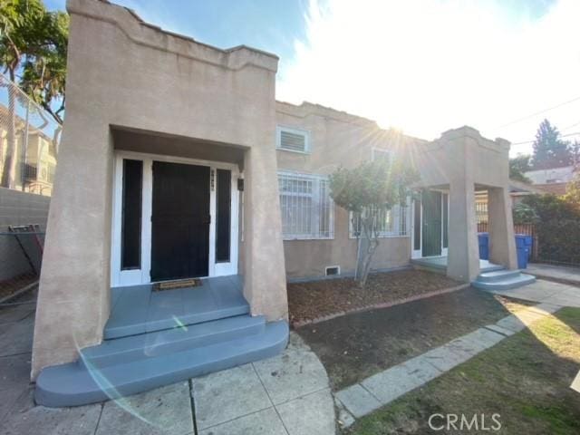 3030 W 12th Pl, Los Angeles, CA 90006 - property entrance featuring stucco siding