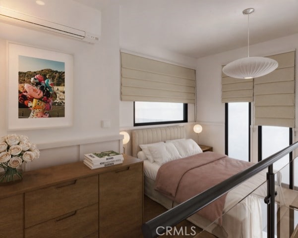 3030 W 12th Pl, Los Angeles, CA 90006 - bedroom with multiple windows and a wall mounted air conditioner