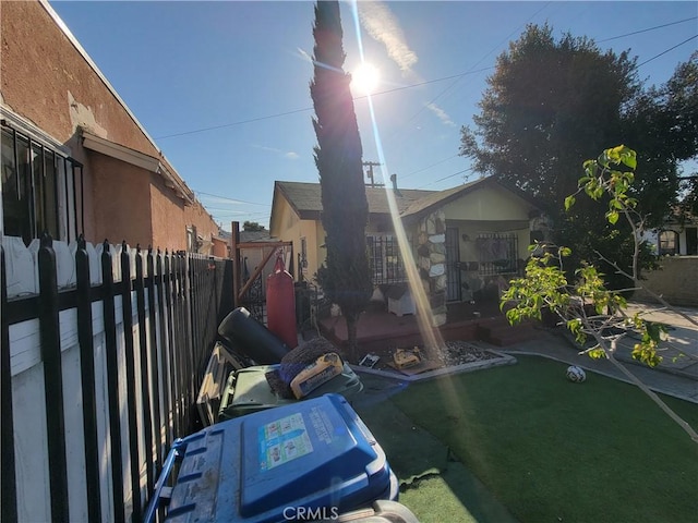 5510 S San Pedro St, Los Angeles, CA 90011 - view of side of home featuring fence