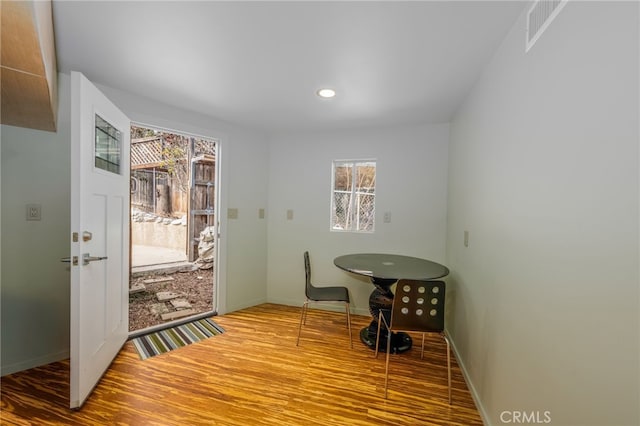 dining area featuring visible vents, recessed lighting, baseboards, and wood finished floors