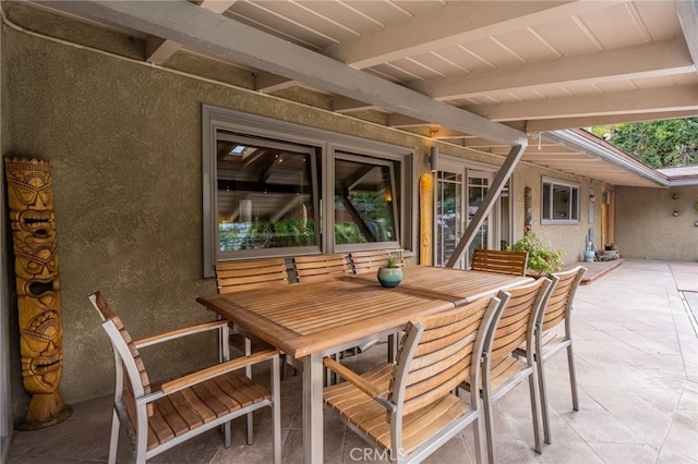 view of patio with outdoor dining space