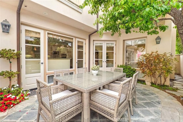 129 Via Waziers, Newport Beach, CA 92663 - view of patio / terrace featuring french doors and outdoor dining space