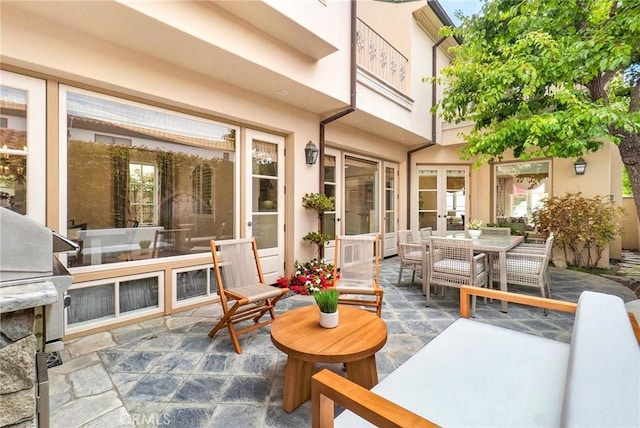 129 Via Waziers, Newport Beach, CA 92663 - view of patio with outdoor dining space, french doors, and grilling area
