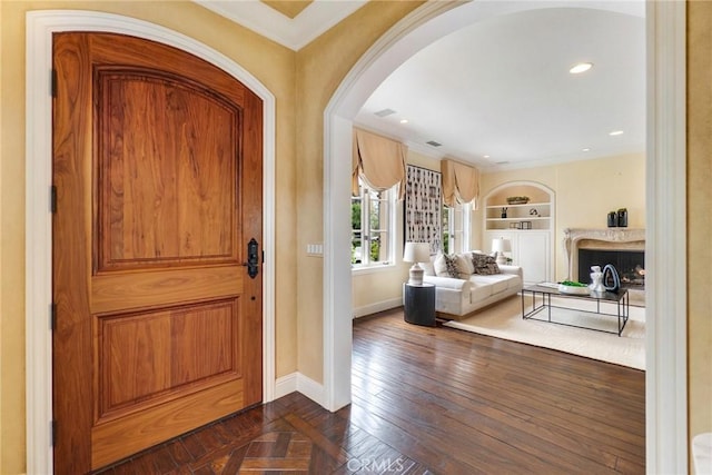 129 Via Waziers, Newport Beach, CA 92663 - entrance foyer with baseboards, arched walkways, ornamental molding, recessed lighting, and parquet floors