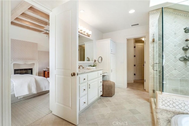 129 Via Waziers, Newport Beach, CA 92663 - full bath featuring vanity, a shower stall, ensuite bathroom, a fireplace, and a tub