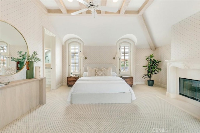 129 Via Waziers, Newport Beach, CA 92663 - carpeted bedroom featuring wallpapered walls, a glass covered fireplace, and ceiling fan