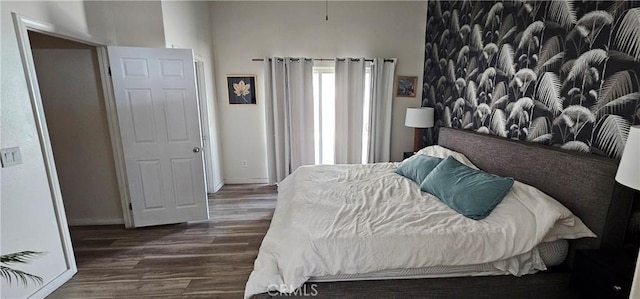 15781 Coral St, Palm Springs, CA 92262 - bedroom featuring wood finished floors and baseboards