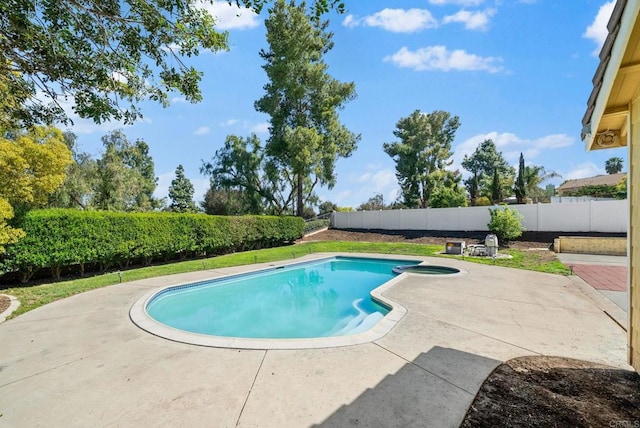 view of swimming pool with a fenced in pool, a fenced backyard, and a patio area
