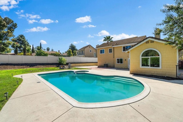 view of swimming pool with a fenced in pool, a fenced backyard, and a patio area