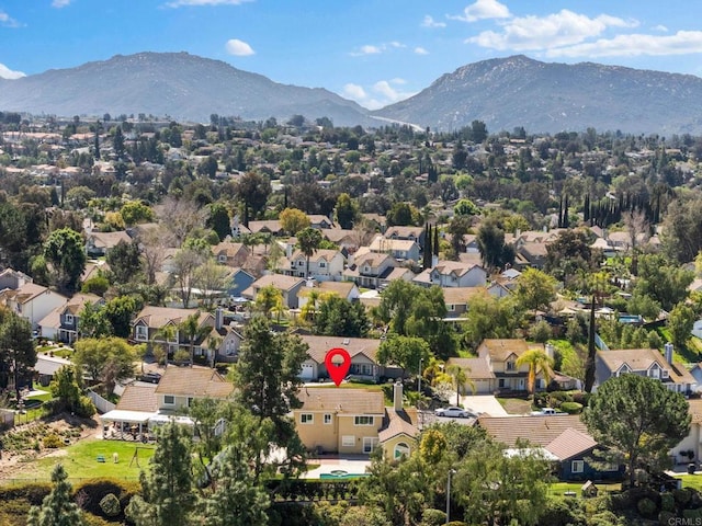 bird's eye view featuring a residential view and a mountain view