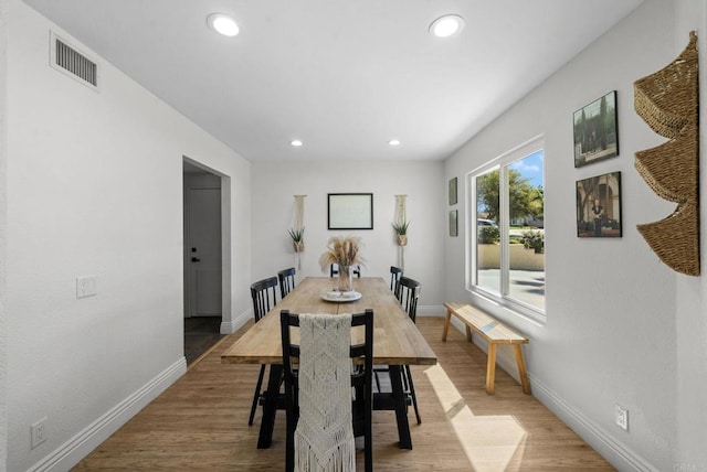 dining area with baseboards, recessed lighting, and visible vents