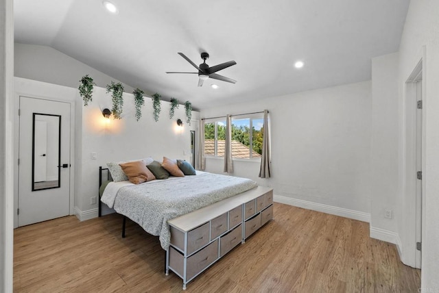 bedroom with light wood-style floors, recessed lighting, baseboards, and vaulted ceiling