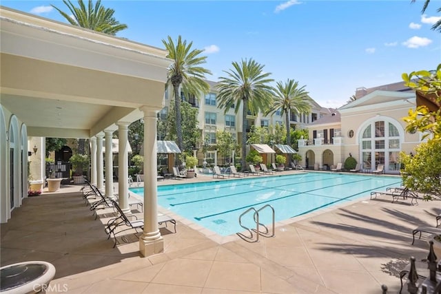 pool with a patio area