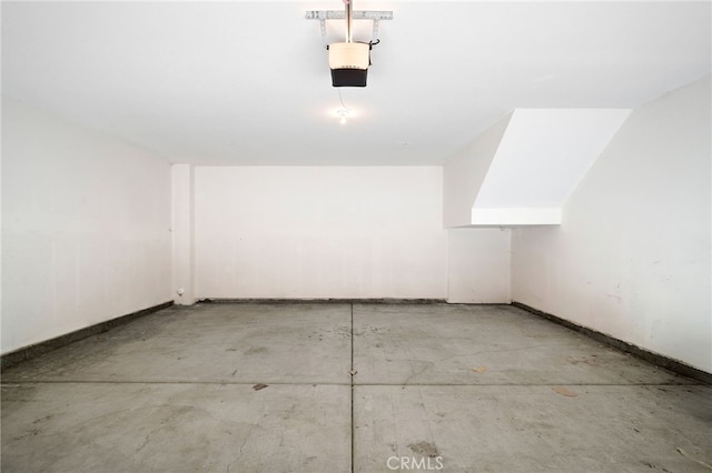 36337 Vincenzo Way, Winchester, CA 92596 - garage with baseboards and a garage door opener
