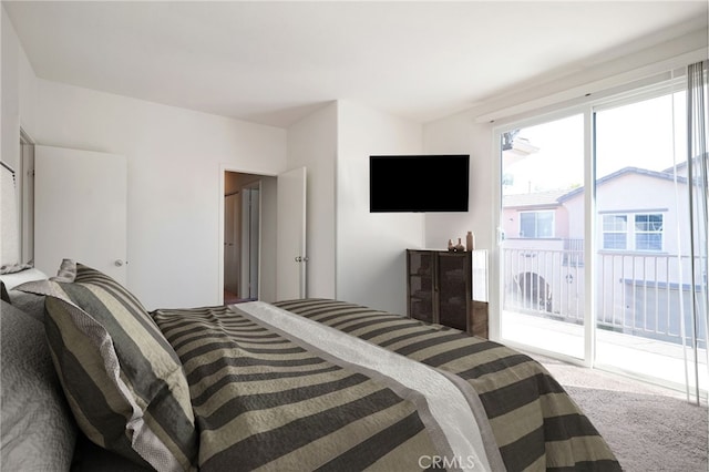 36337 Vincenzo Way, Winchester, CA 92596 - bedroom featuring access to outside, multiple windows, and carpet